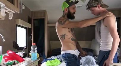 Inked stud barebacks gay stepson before a creamy finish