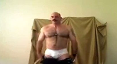 Very Muscular Cop Stripping Down To White Briefs