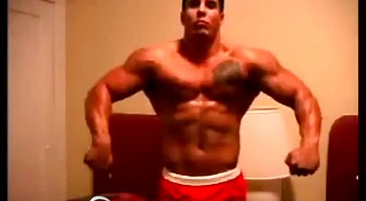 Gauge Flexing and Posing Stripping Down To A Black Jockstrap