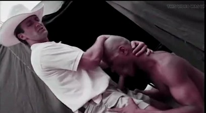 Hot white cowboy gets his stiff tool blown by eager black hunk