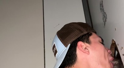 sucking a big black cock glory hole