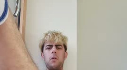 Young trans guy masturbating in pyjama