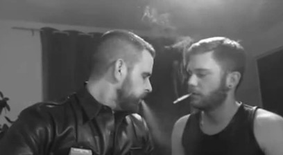 Two Muscular Guys Smoking And Kissing