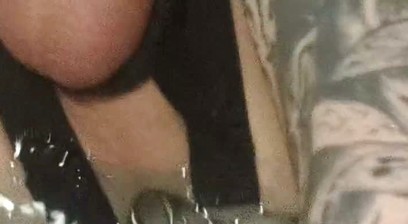 Enema, anal shower. Close-up view through anal mirror. Anal with water. Filling anal with water